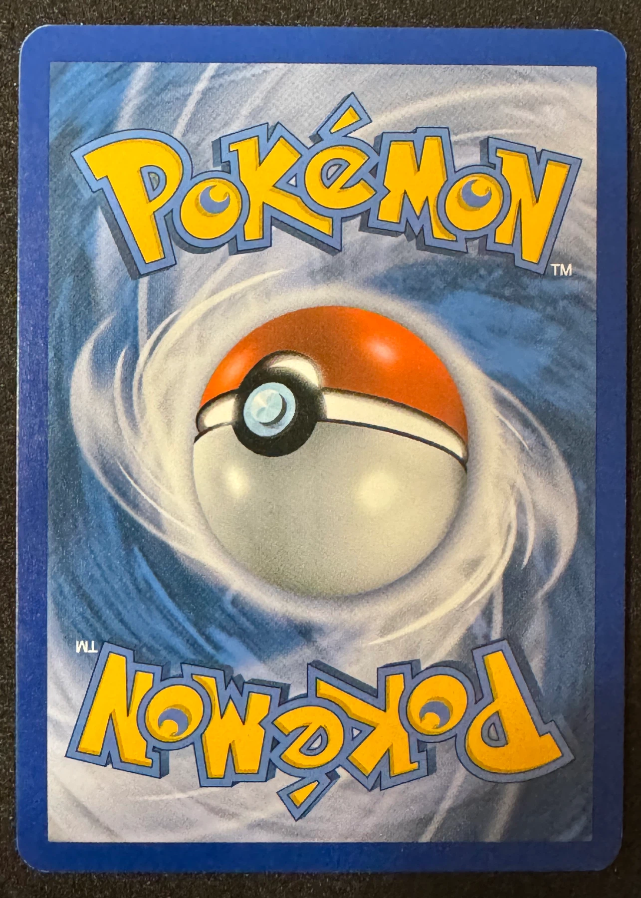 Umbreon 086/90 Undaunted back card photo in GradeValue pregrading report