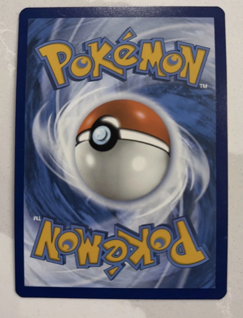 Pikachu TG05/196 Lost Origin back card photo in GradeValue pregrading report