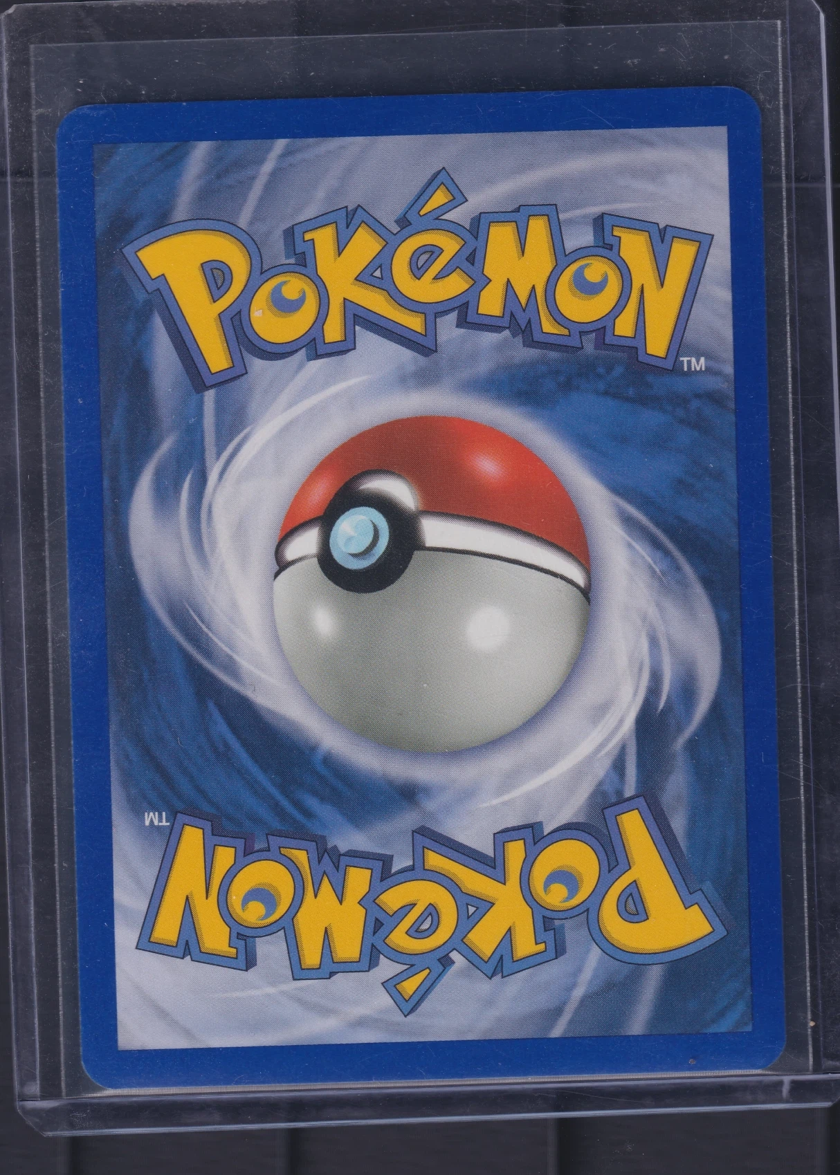 Dark Tyranitar 019/109 Team Rocket Returns back card photo in GradeValue pregrading report