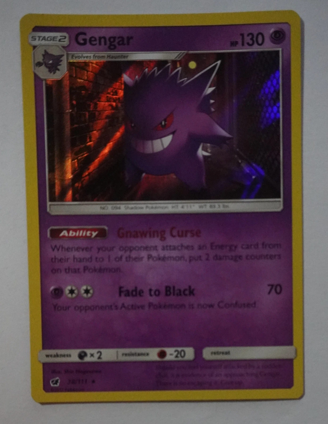 Gengar 038/111 (Holo) Crimson Invasion front card photo in GradeValue pregrading report