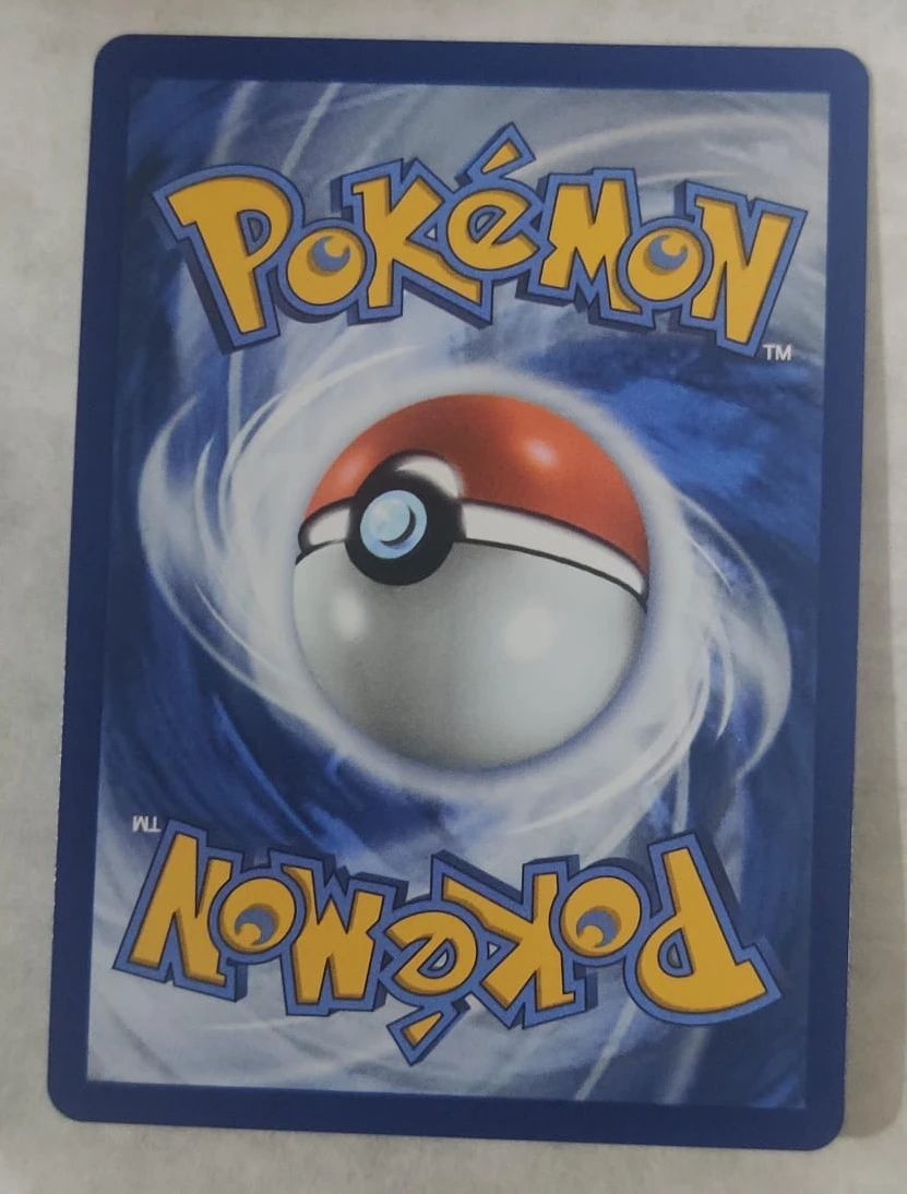 Eri 136/131 Prismatic Evolutions back card photo in GradeValue pregrading report