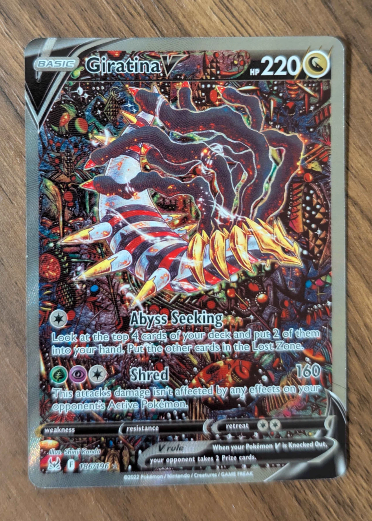 Giratina V 186/196 Lost Origin front card photo in GradeValue pregrading report