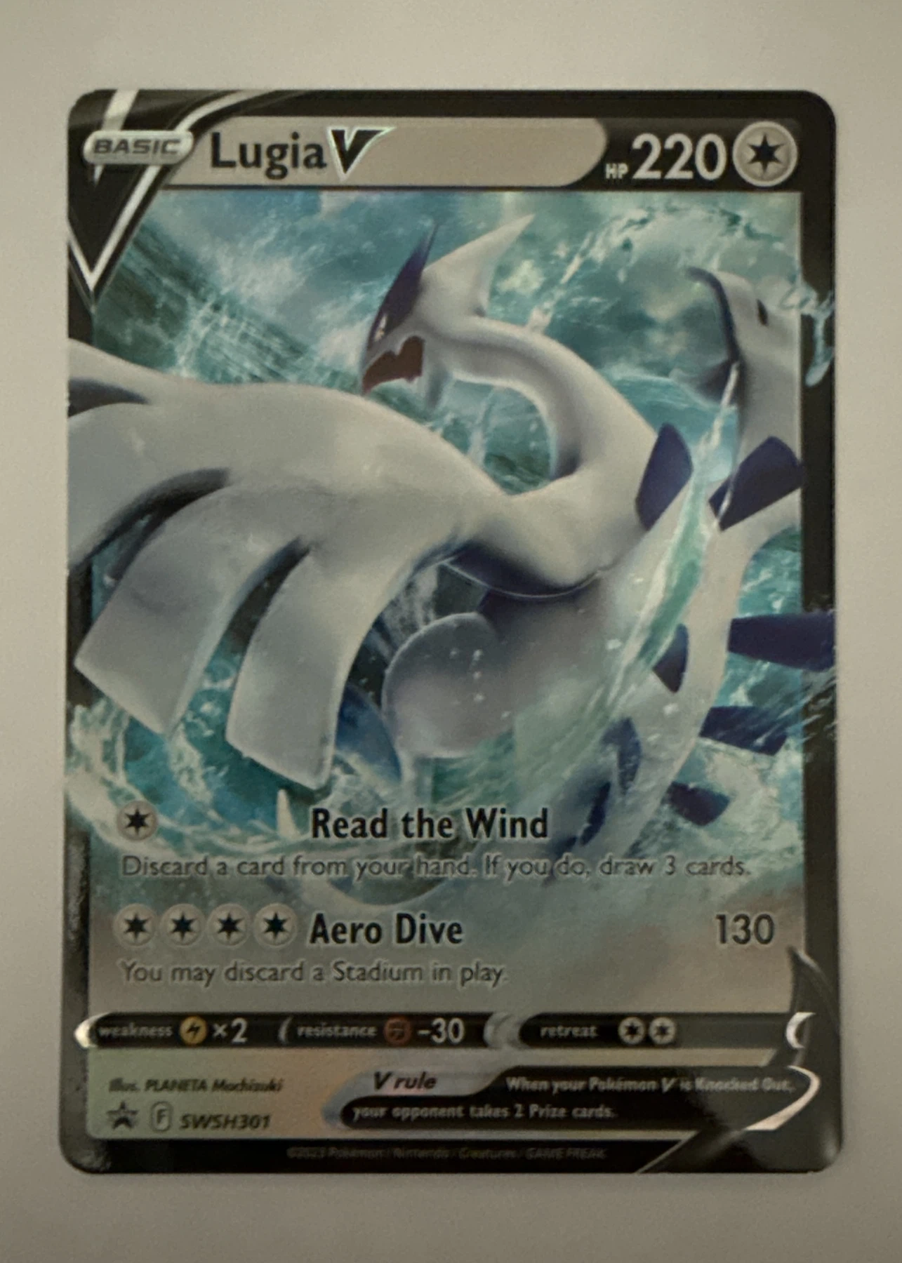 Lugia V SWSH301/307 SWSH Black Star Promos front card photo in GradeValue pregrading report