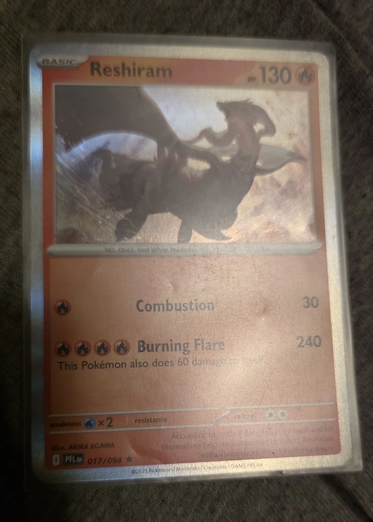 Reshiram 017/94 Phantasmal Flames front card photo in GradeValue pregrading report