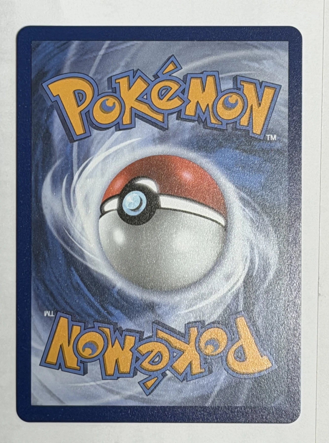 Galarian Meowth 141/128 30th Celebration back card photo in GradeValue pregrading report