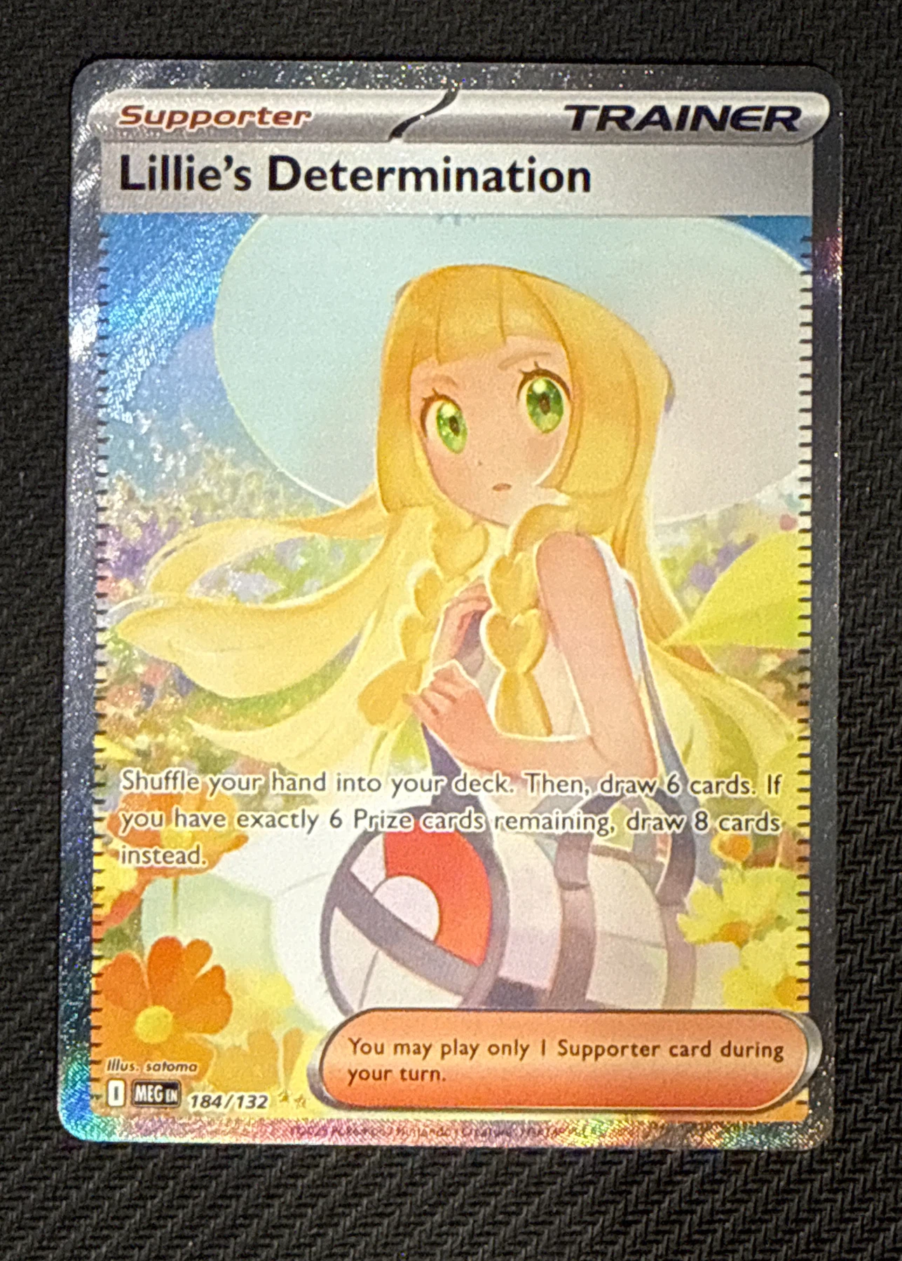 Lillie's Determination 184/132 Mega Evolution front card photo in GradeValue pregrading report