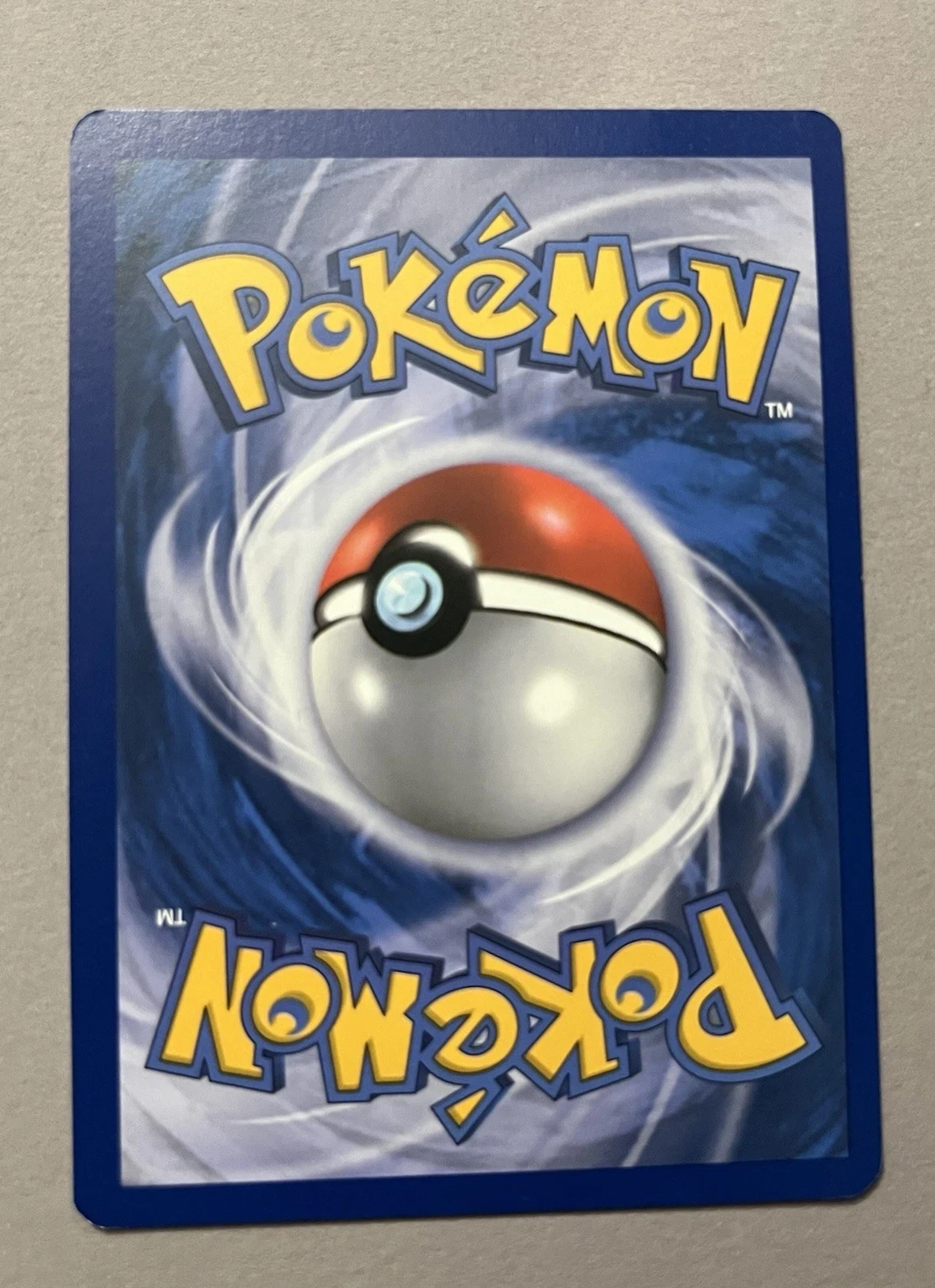 Typhlosion 032/123 HeartGold SoulSilver back card photo in GradeValue pregrading report