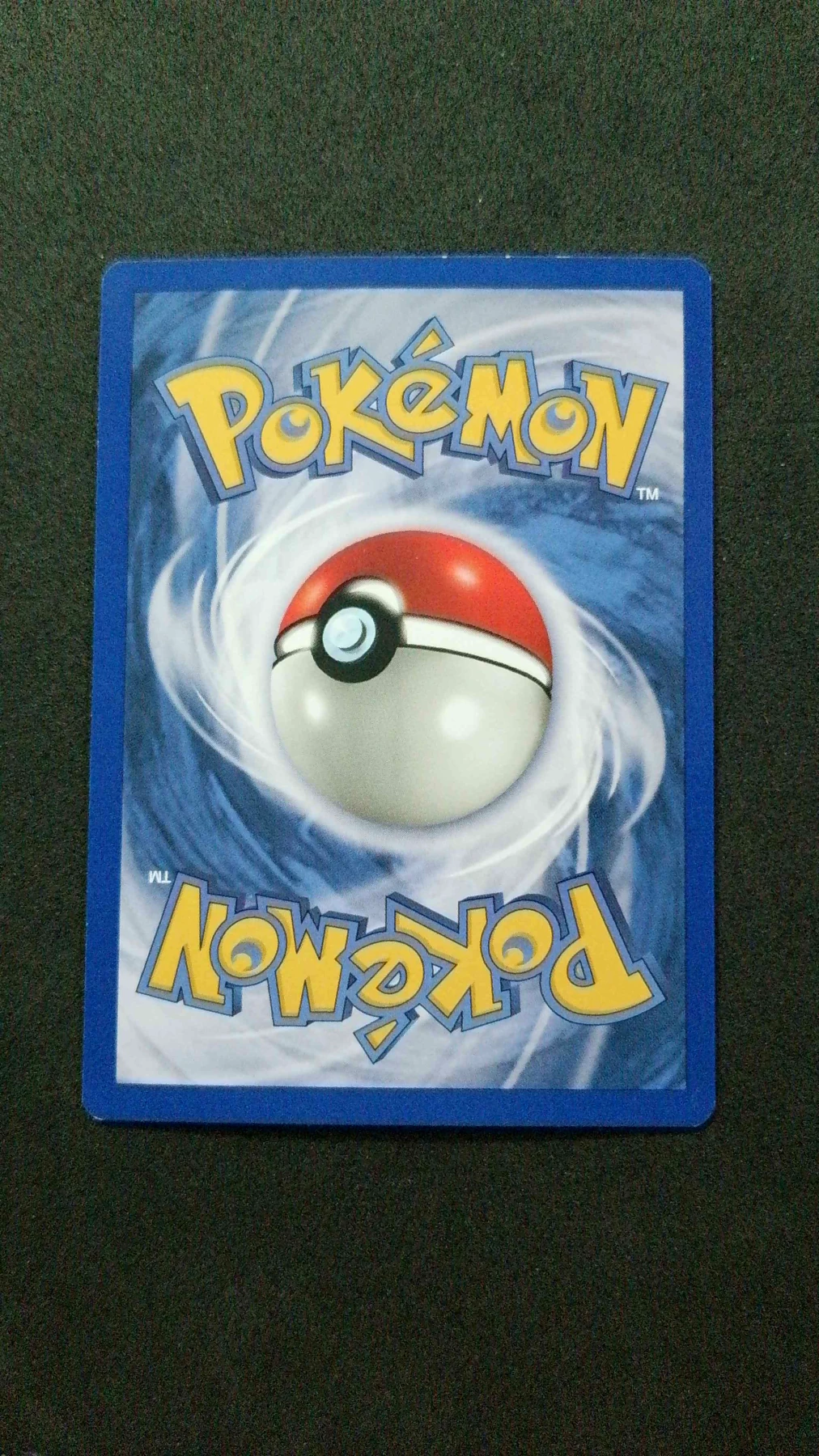 Charizard 004/102 · Holo Base Set back card photo in GradeValue pregrading report