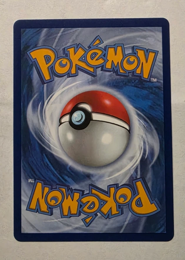 Mega Charizard X ex 125/94 Phantasmal Flames back card photo in GradeValue pregrading report