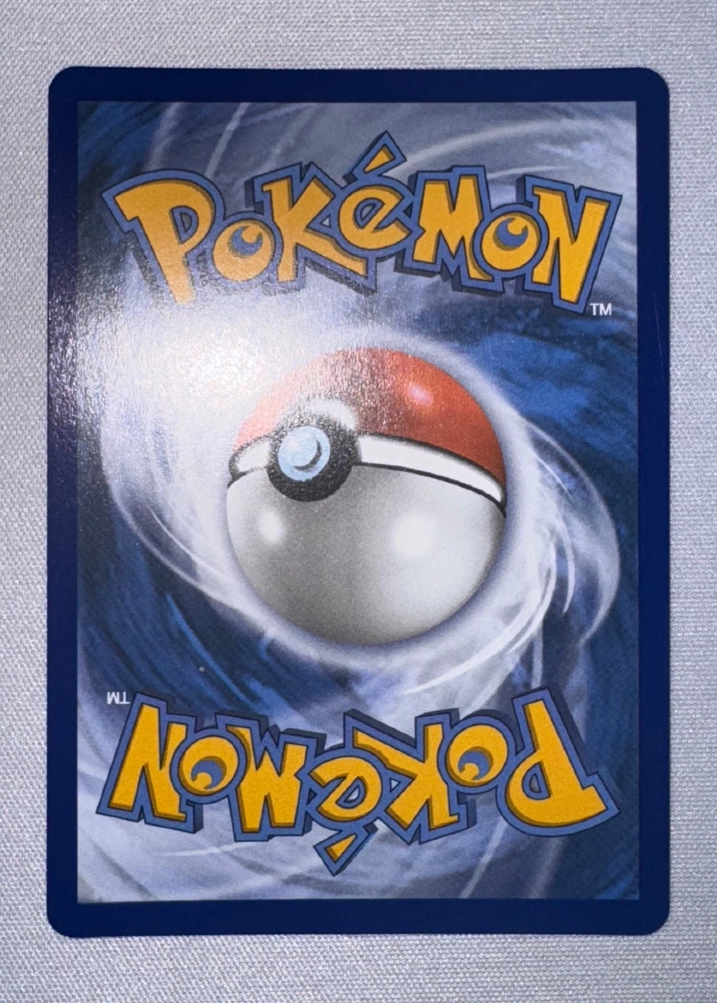Surfing Pikachu 111/108 Evolutions back card photo in GradeValue pregrading report