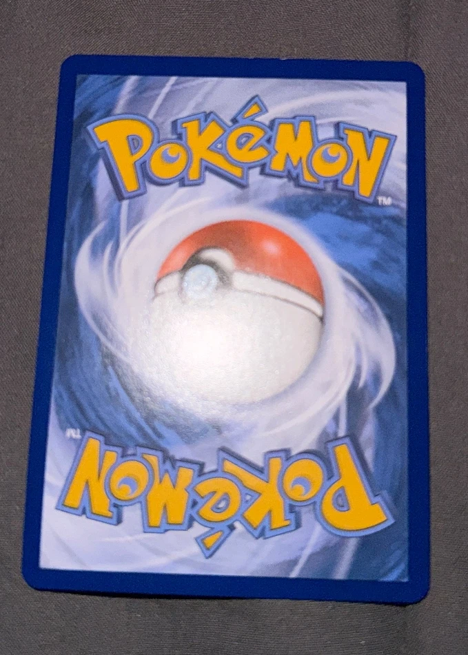 Latias & Latios GX 113/181 Team Up back card photo in GradeValue pregrading report