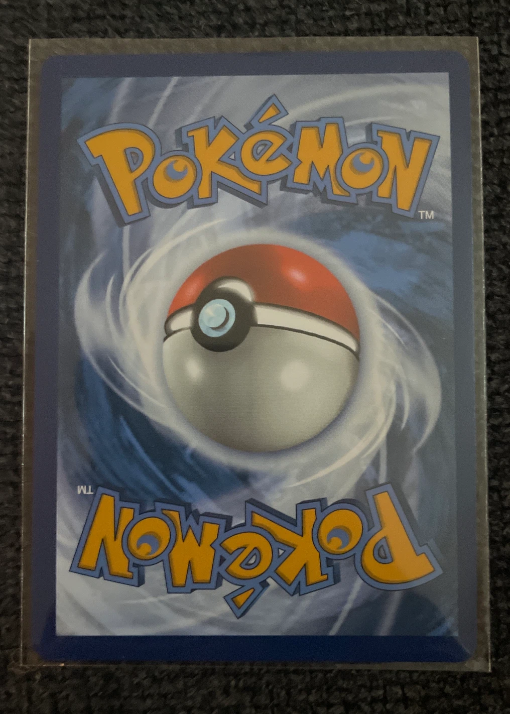 Alolan Exeggutor ex 242/191 Surging Sparks back card photo in GradeValue pregrading report