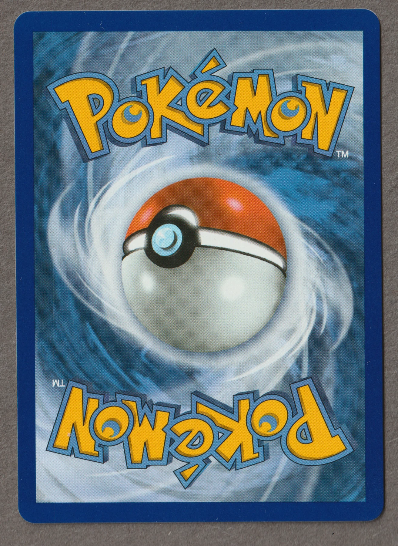 Mega Charizard X ex 125/94 Phantasmal Flames back card photo in GradeValue pregrading report