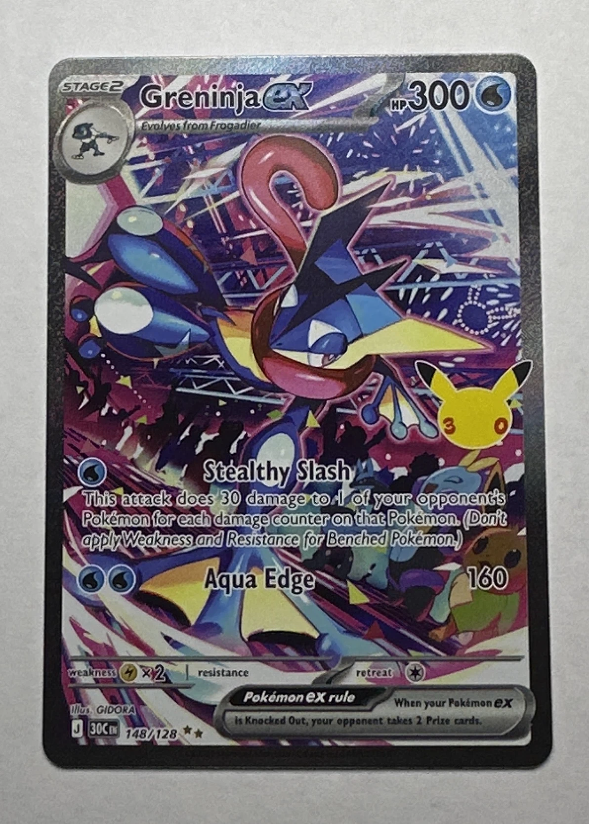 Greninja ex 148/128 30th Celebration front card photo in GradeValue pregrading report