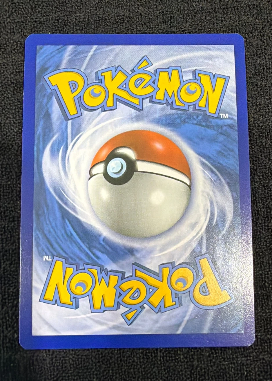 Charizard 011/108 Evolutions back card photo in GradeValue pregrading report