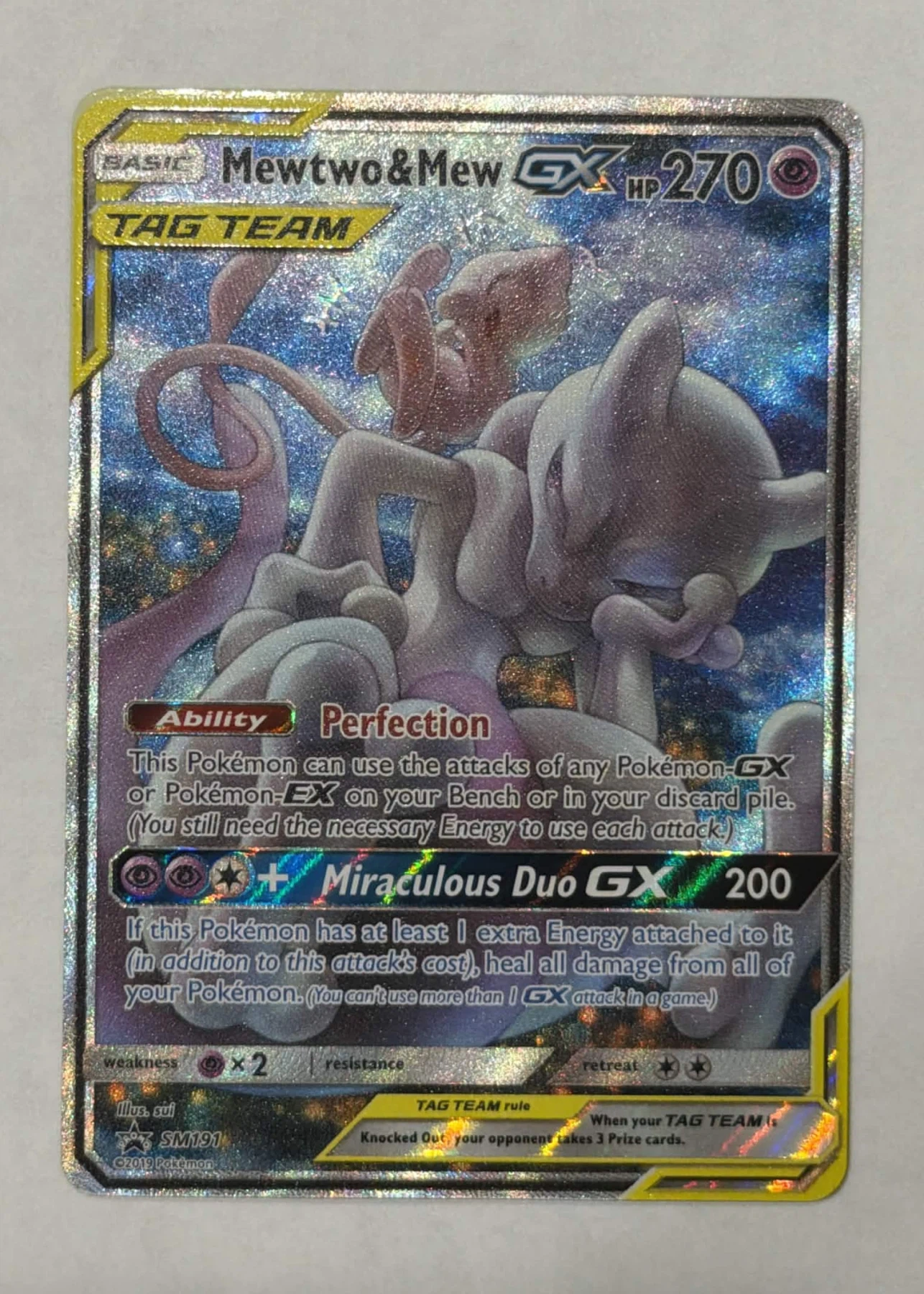 Mewtwo & Mew GX SM191/248 SM Black Star Promos front card photo in GradeValue pregrading report