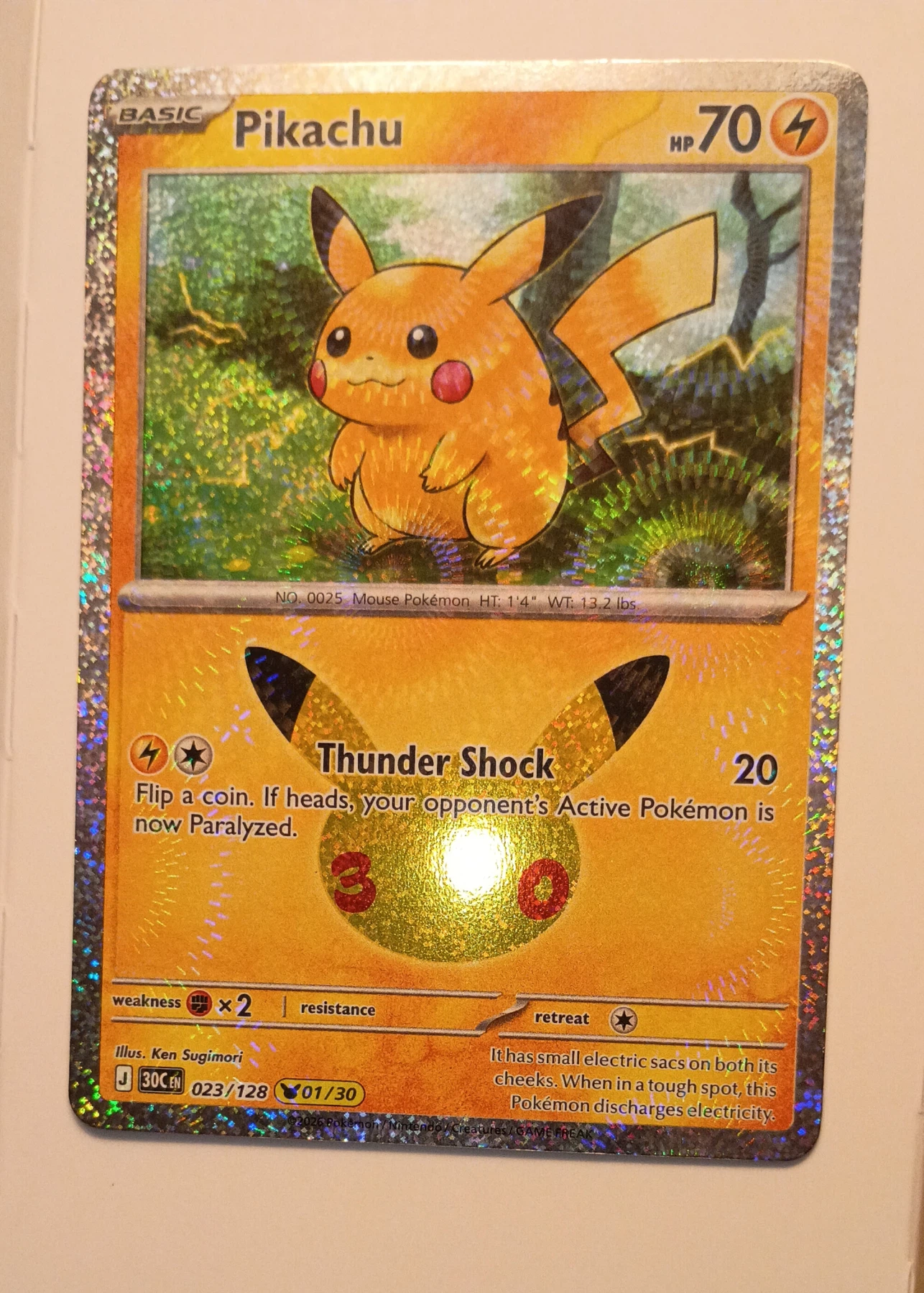 Pikachu 023/128 30th Celebration front card photo in GradeValue pregrading report