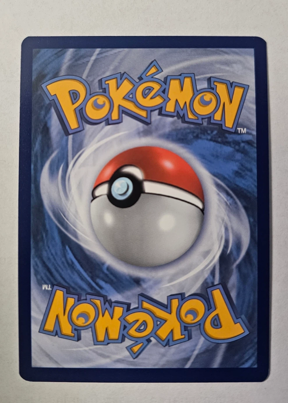 Slowpoke & Psyduck GX 035/236 Unified Minds back card photo in GradeValue pregrading report
